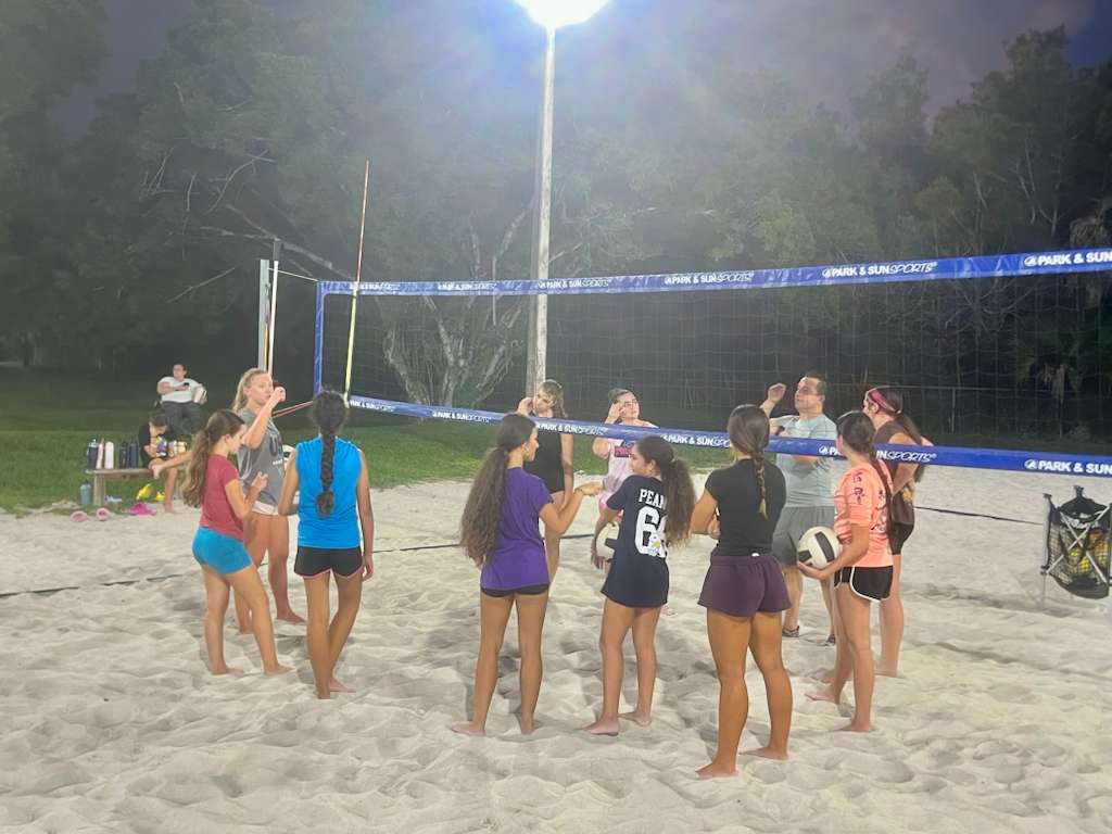 Beach volleyball players training on Miami beach