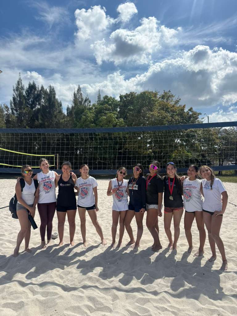 Competitive volleyball athletes competing in Miami tournament